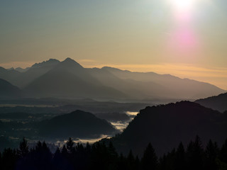 View on the beautiful sunrise over the majestic hills with the Lake Bled in Slovenia
