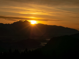 View on the beautiful sunrise over the majestic hills with the Lake Bled in Slovenia