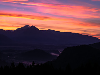 View on the beautiful sunrise over the majestic hills with the Lake Bled in Slovenia