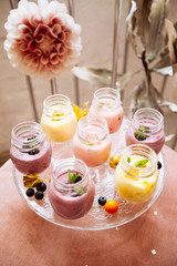 Fototapeta na wymiar Beautifully decorated catering banquet table with smoothie