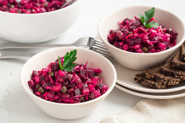 Russian beetroot salad vinaigrette. Homemade. On white background.