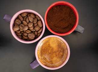 Obraz na płótnie Canvas coffee cup assortment top view collection, espresso cup assortment with coffee and beans top view collection isolated on dark background.