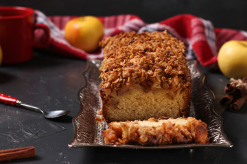 Homemade cupcake with oatmeal, apples and crunchy cereals oatmeal on a metal tray on a dark background