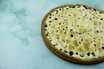 Blackcurrant and blueberry pie with protein sauce