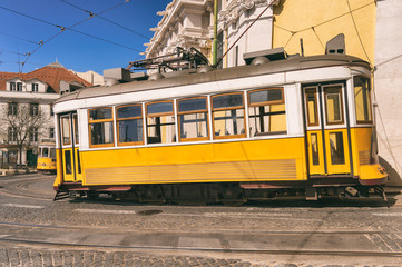 Fototapeta na wymiar Yellow Tram 28 in Lisbon, Portugal