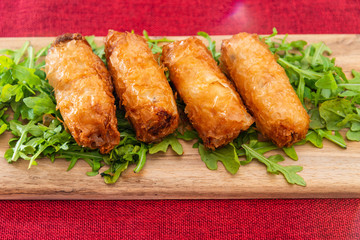 spring rolls Rice cakes stuffed with a pork stuffing accompanied by sauce