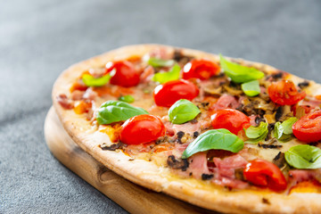 pizza cooked with standard cooked ham and mushrooms