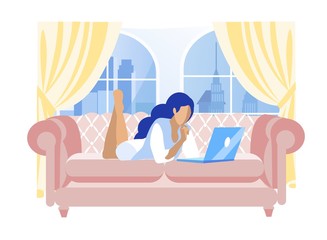 Young Woman at Home, Lying on Sofa with Her Laptop