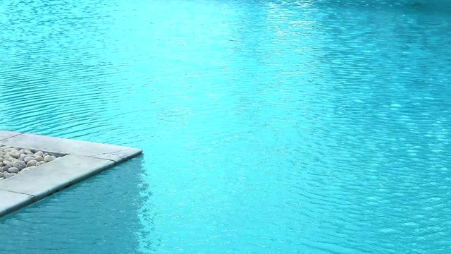 conner of marble and stone and wave on water surface in pool