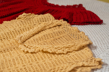 Crochet dresses and table tops, View of yarn ball with needed and crochet pattern