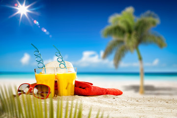 Summer drink on beach and free space for your decoration. 