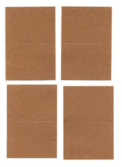 Four Pieces of Cardboard Stock Paper on White