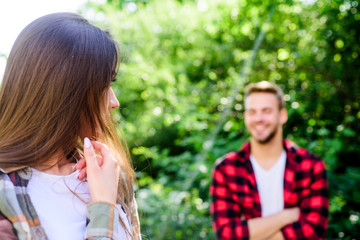 Fototapeta premium Loving people. happy valentines day. summer camping in forest. family weekend. romantic date. girl in selective focus with man in park. first meet of couple outdoor. Relationship. couple in love