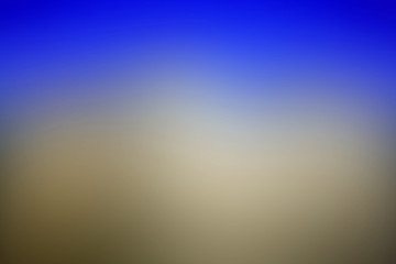 Abstract defocused blurred blue brown distressed stone texture grunge blue sky effect background stock photo