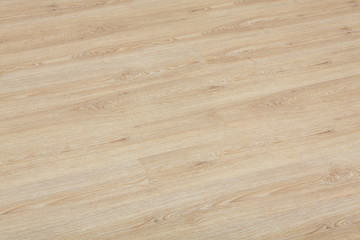 Naklejka premium Wooden natural texture. New parquet blank. Wooden laminate floor boards background image. Home decor.