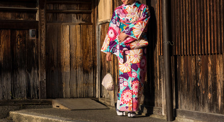 Asian woman wearing japanese traditional kimono at Yasaka Pagoda and Sannen Zaka Street in Kyoto, Japan.