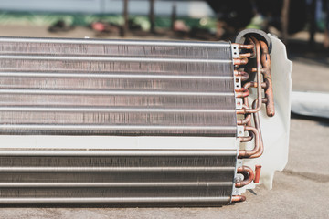 The air conditioner coil is a part of the system where the refrigerant absorbs heat.