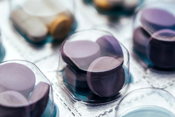 Close up of pills in blisters for every day of the week for the morning, day, night time. Medications for patients in a hospital.