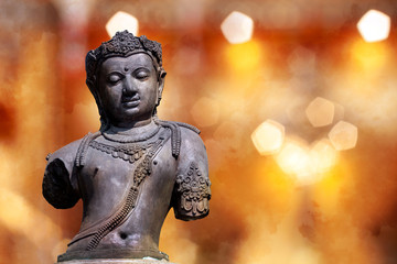 Old Buddha, Rock Buddha statue with sunlight background,