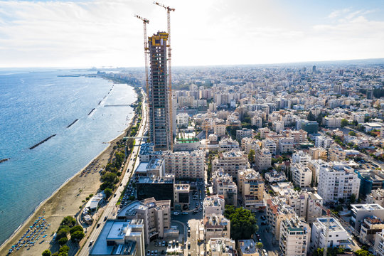 Aerial view of Limassol with high-rise building construction site