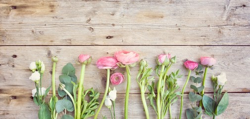bouquet of flowers on wooden background with copy space for text