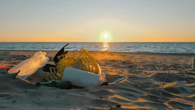 Plastic Garbage pile on beach sunset sea motion,polluted nature,people timelapse