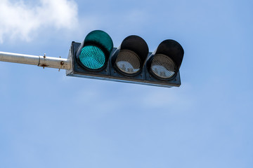 Traffic lights of a city on the street in Singapore, closeup