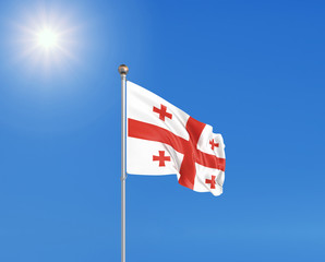 3D illustration. Colored waving flag of Georgia on sunny blue sky background.