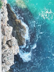 waves crashing on rocks