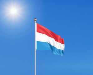 3D illustration. Colored waving flag of Luxembourg on sunny blue sky background.