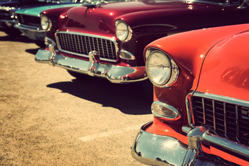 classic vintage cars parked in a row