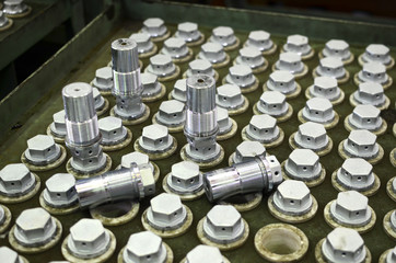 Background of screw bolts, Internal screw, bolts closeup, many screws. Factory equipment and...