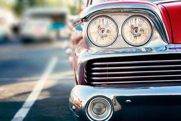 Classic car headlights close-up, car street show