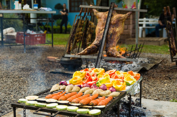 Meat and vegetable exhibition on a barbecue known as Parrilla. Typical barbecue from the south of...