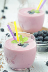 Two glasses with blueberry yogurt