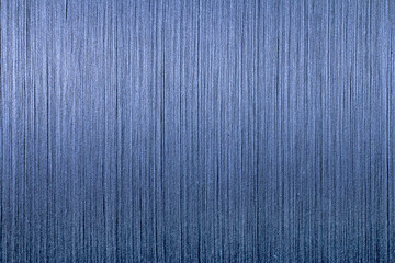 blue cotton thread from weaving machine, Indigo dyed yarn woven background,