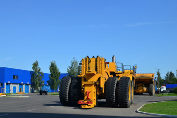 Largest recovery truck for evacuation of inoperative dump trucks and other quarry equipment to repair station on technological roads under various climatic conditions.