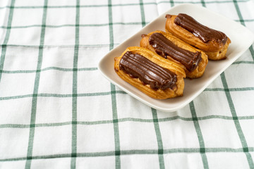 cakes chocolate icing tablecloth cage background