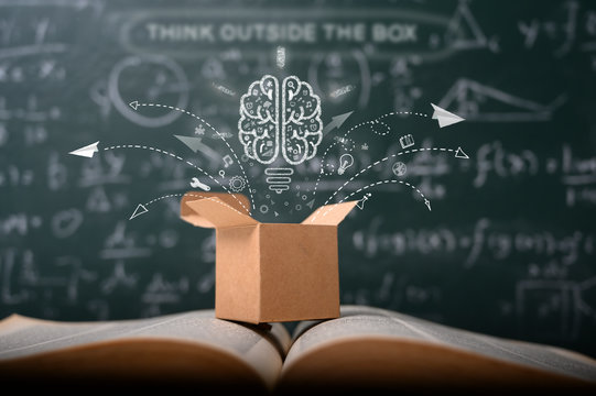 think outside the box on school green blackboard . startup  education concept. creative idea. leadership.