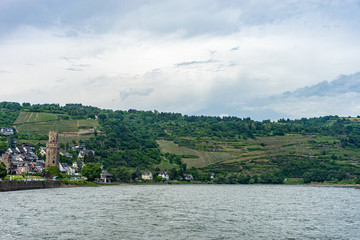 Germany, Rhine Romantic Cruise, a large body of water with a mountain in the background