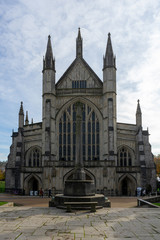 The exterior of Winchester cathedral in Winchester, Hampshire, UK