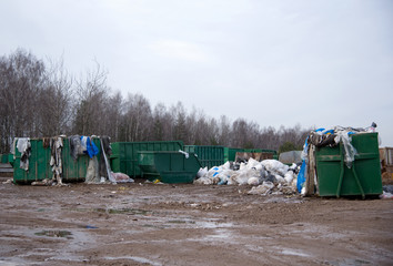 Metal tanks and capacities for storage and transportation of garbage. Metal trash cans and...