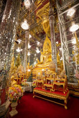 Uthai Thani District, Uthai Thani / Thailand / March 01, 2020 : Wat Tha Sung (Chantaram). Buddhist temple complex featuring an interior adorned with shiny, mirrored tiles & columns..