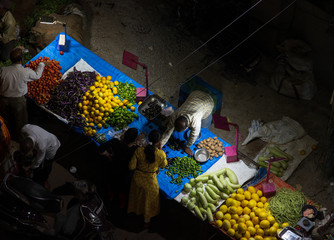 Market stalls selling fruit and vegetables in India