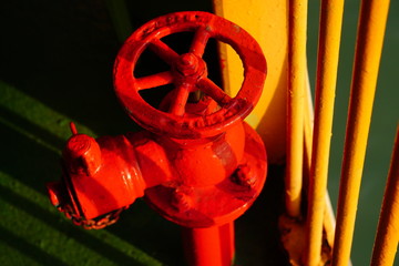 Close up red water hydrant on a ferry. Safety over water