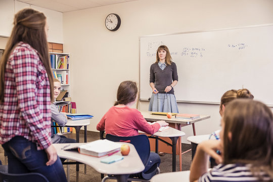 School kids in school classroom listening to teacher. Red Lodge, Montana, USA
