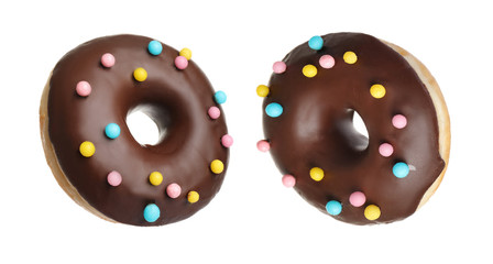 Collage with delicious glazed donuts on white background