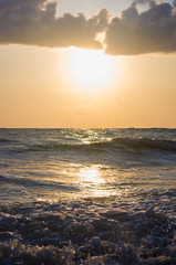 Amazing sea sunset, the sun, waves, clouds
