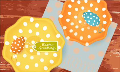 Easter Greetings banner with Easter Eggs, plates, napkin, tag on abstract background, holiday