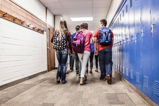 School kids hanging out in the hallway and at the lockers of their school. Red Lodge, Montana, USA